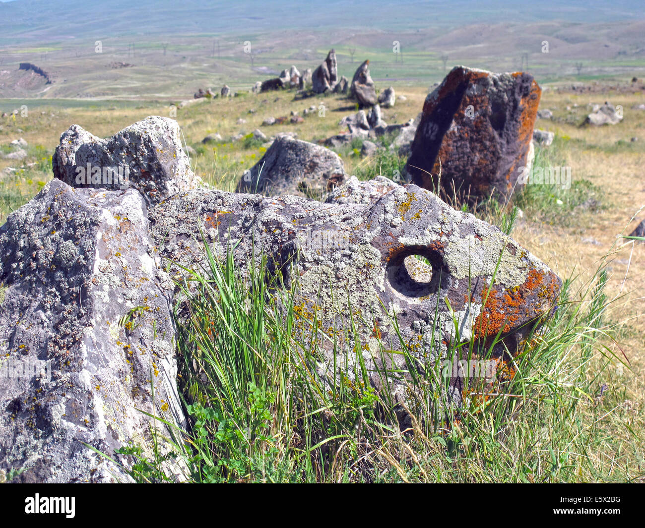 Sisian, Armenia. 27th June, 2014. Megaliths are seen at the prehistoric archaeological site Zorats Karer near Sisian, Armenia, 27 June 2014. The site served as a necropolis from the Middle Bronze Age to the Iron Age. Photo: Jens Kalaene -NO WIRE SERVICE-/dpa/Alamy Live News Stock Photo