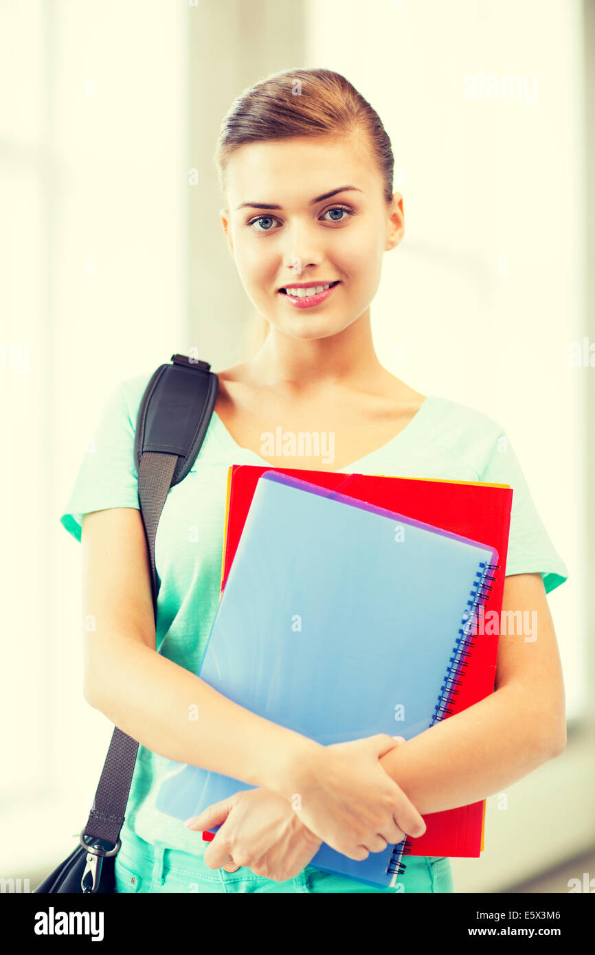 student girl with school bag and notebooks Stock Photo - Alamy