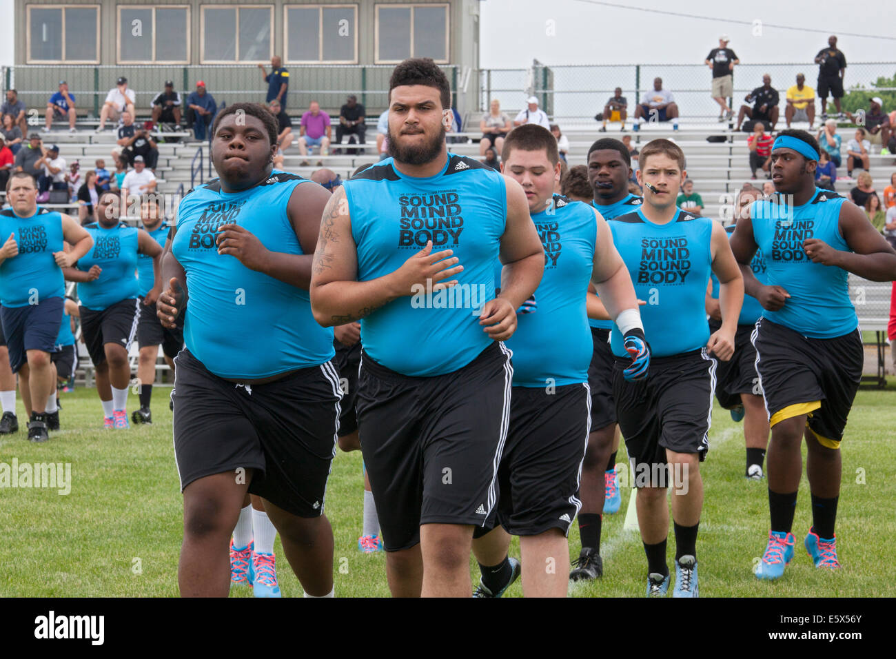 Harper Woods, Michigan - High school football players attend the Sound Mind Sound Body football camp. Stock Photo