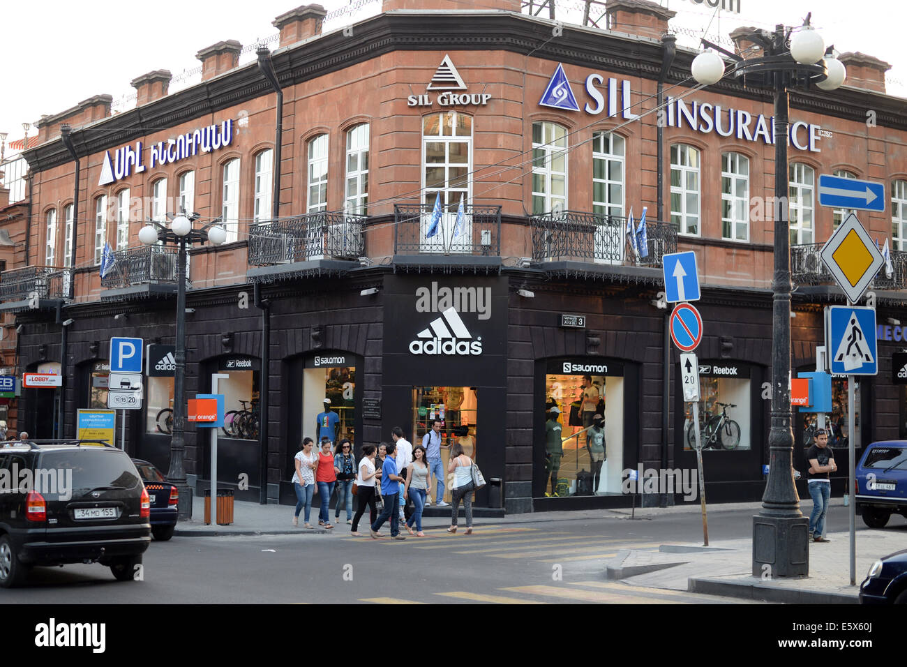 Pedestrians walk past an Adidas-Shop in Yerevan, Armenia, 22 June 2014.  Photo: Jens Kalaene/dpa - NO WIRE SERVICE Stock Photo - Alamy