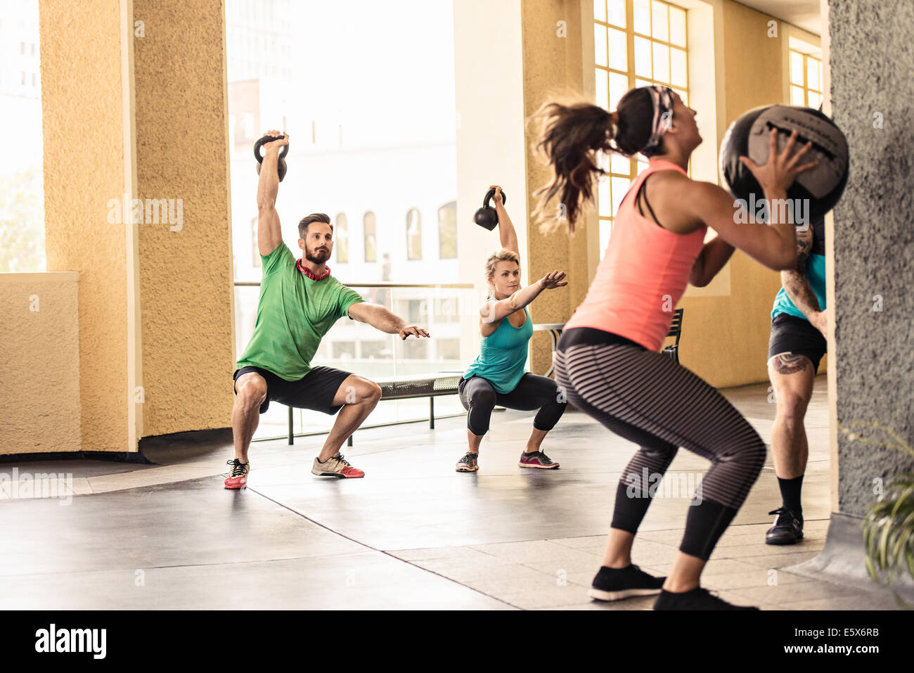 Group of adults doing workout Stock Photo