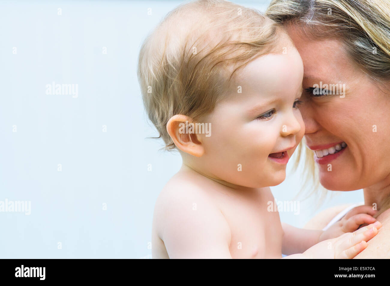 Tender portrait of mid adult mother and baby girl Stock Photo