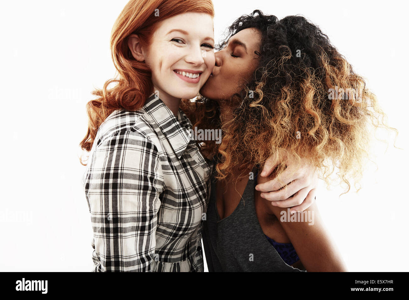 Studio portrait of two young adult women friends Stock Photo