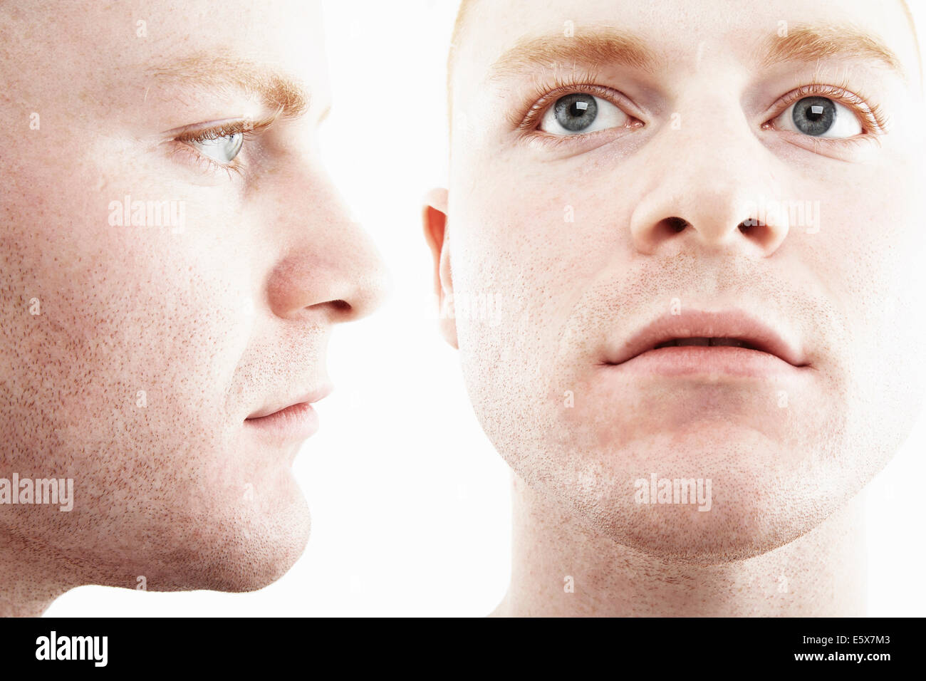 Two time multi exposure of face and profile of young man Stock Photo