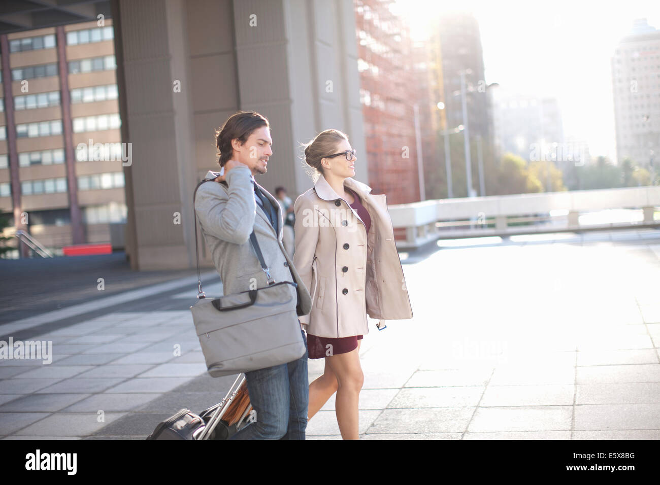 Woman walking side view suit hi-res stock photography and images - Alamy