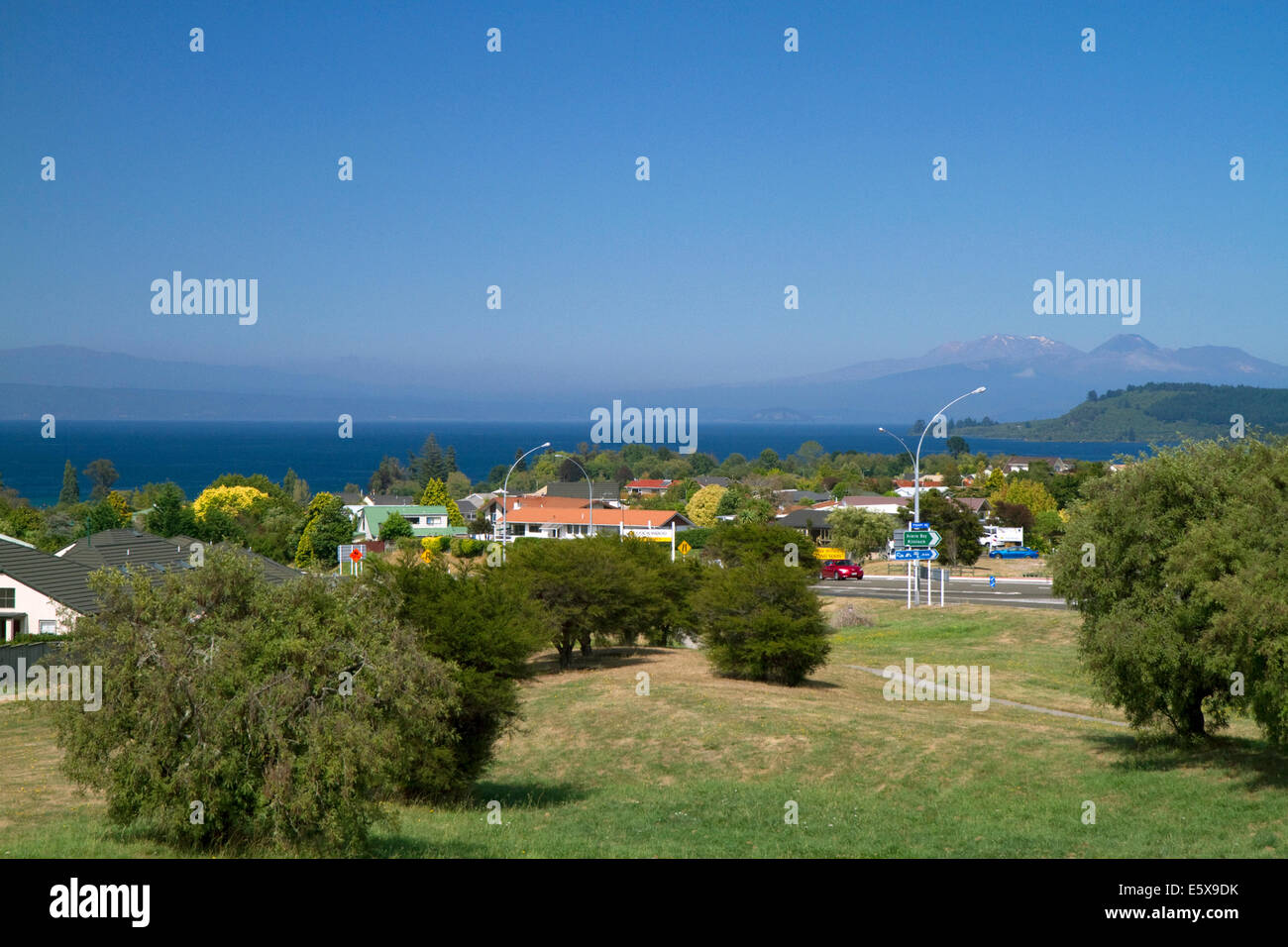 The town of Taupo sits on the shore of Lake Taupo in the Waikato Region, North Island, New Zealand. Stock Photo