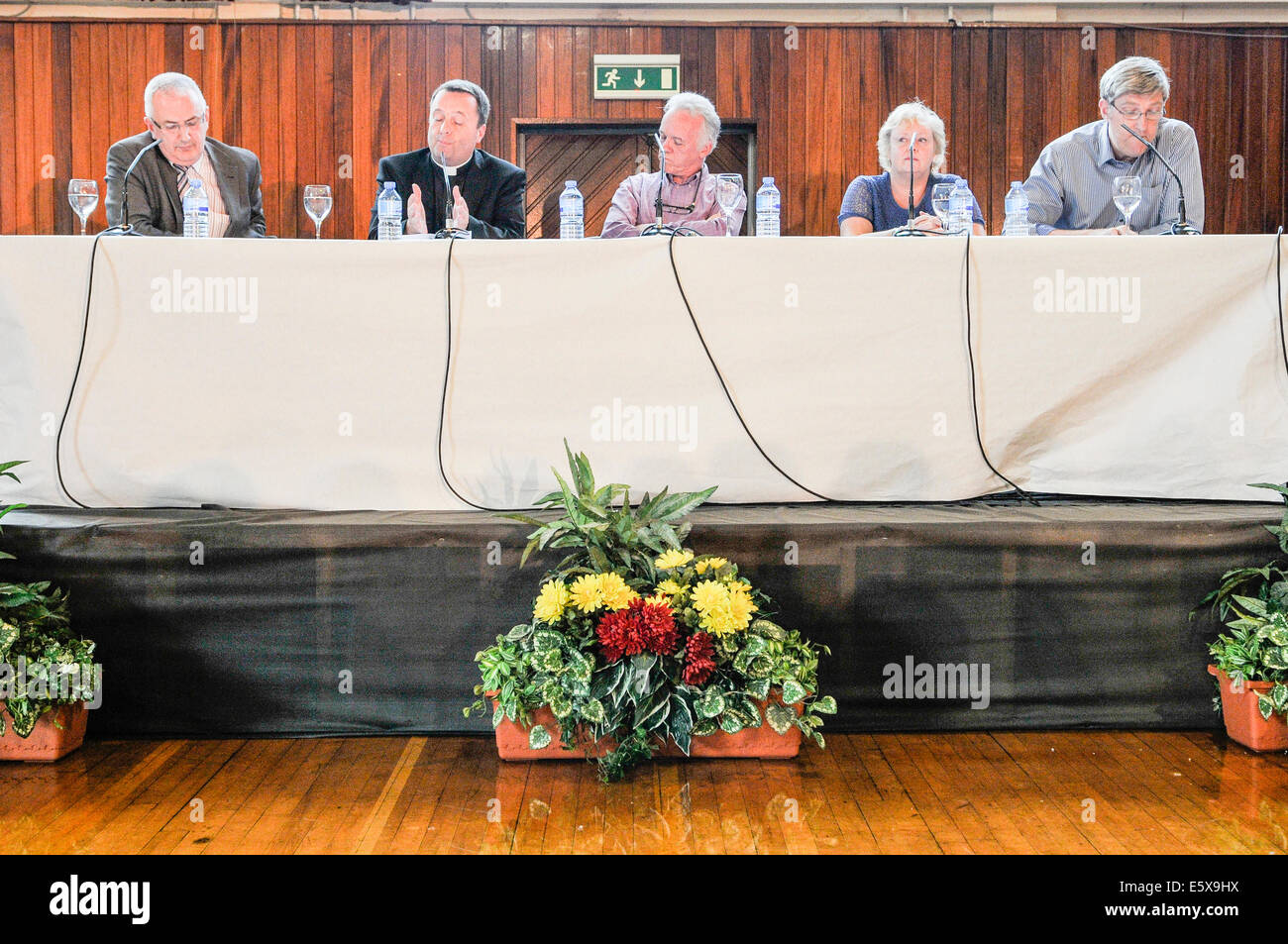 Belfast, Northern Ireland. 6th Aug 2014 - John O'Dowd, Danny Kennedy, Father Tim Bartlett and Rev Lesley Carroll in discussion at West Belfast Talks Back, chaired by Noel Thompson. Credit:  Stephen Barnes/Alamy Live News Stock Photo