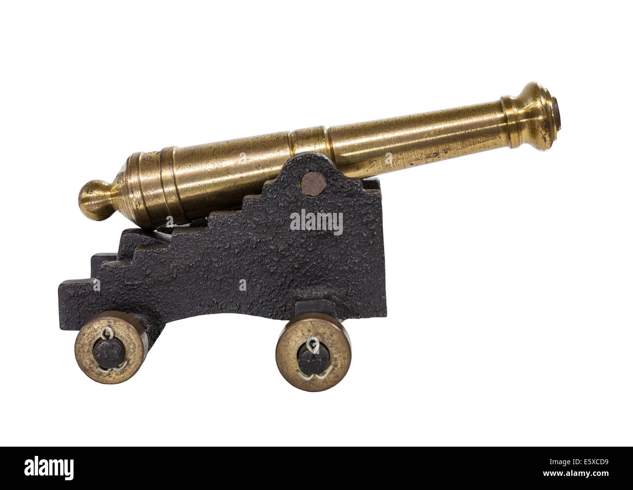 Old toy cannon isolated on white. Stock Photo