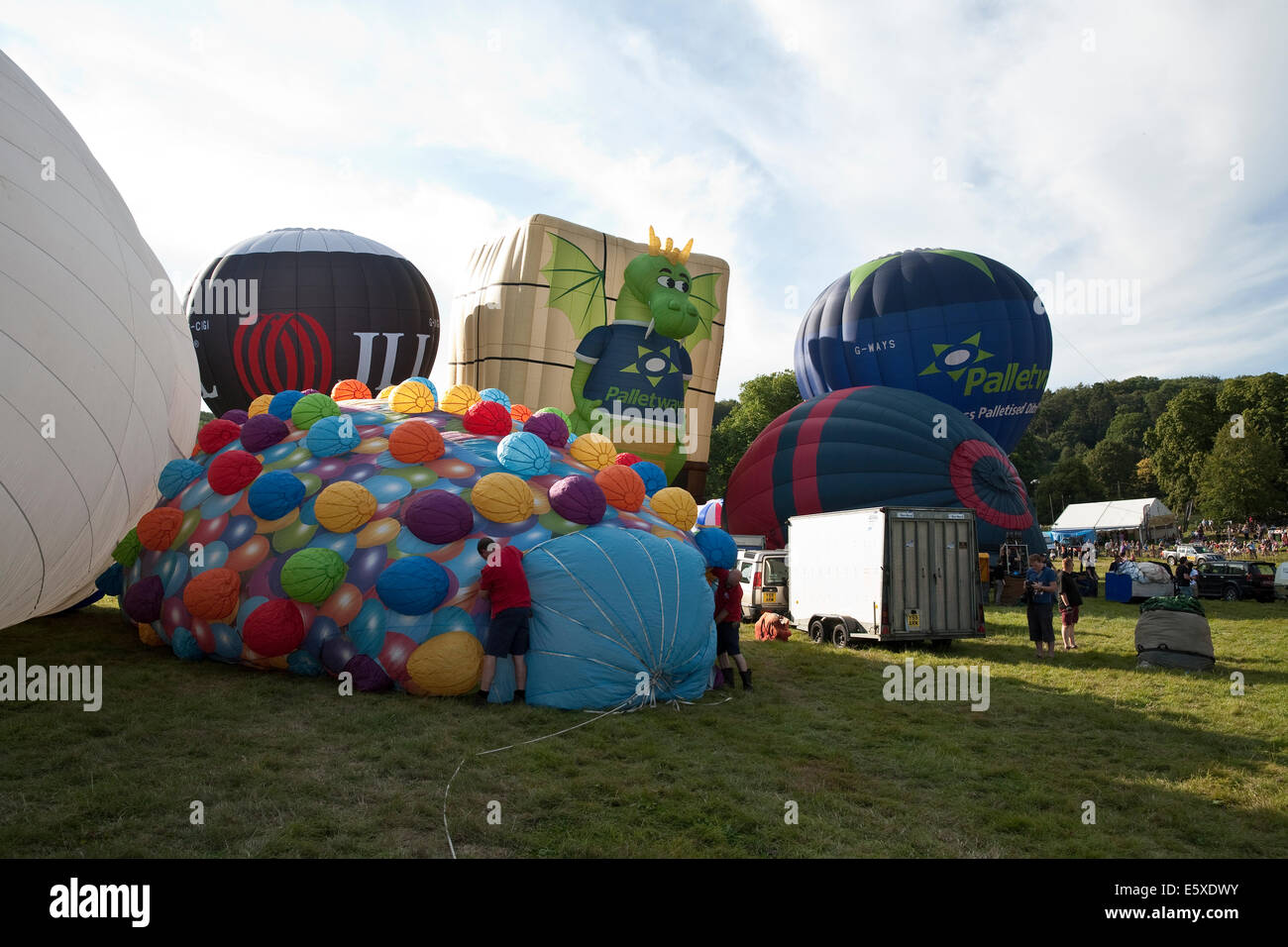 Bristol, UK. 7th August, 2014. Balloon inflation at the evening launch during the Bristol International Balloon Fiesta Credit: Keith Larby/Alamy Live News Stock Photo