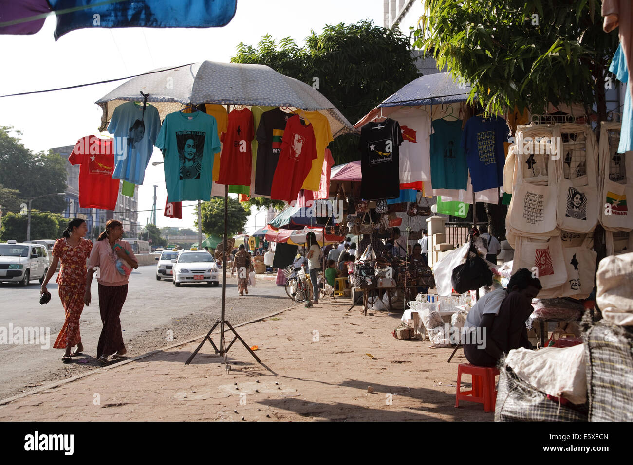 Souvenir T shirts depicting the face of Aung San Suu Kyi for sale on Bogyoke Aung San Road, central Yangon, Myanamar (Burma). Stock Photo