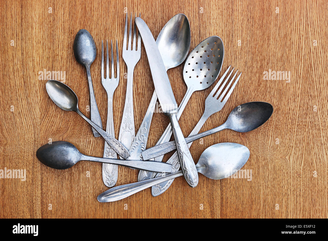 Old aluminum  spoons and forks Stock Photo