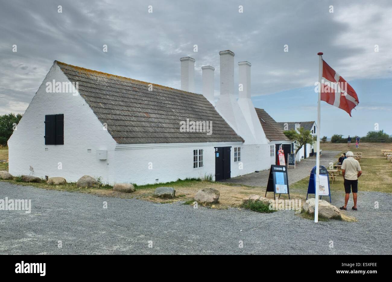 Denmark, Bornholm Island Pictures taken between 1st and 5th August 2014.  Pictured: Herring smokehouse at Hasle City, with Danish flag on the front Stock Photo