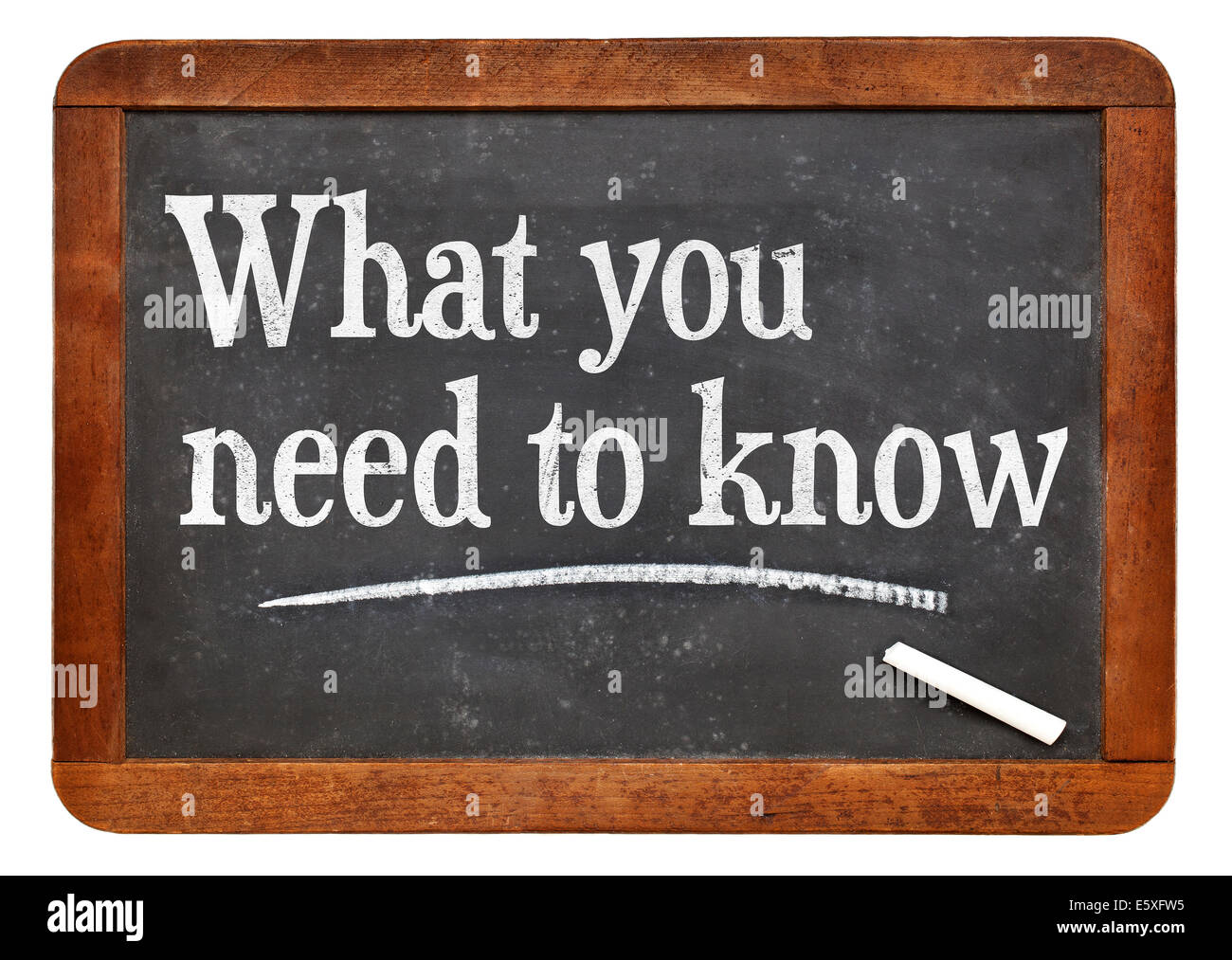 tutorial or advice concept - what you need to know - white chalk text  on a vintage slate blackboard Stock Photo