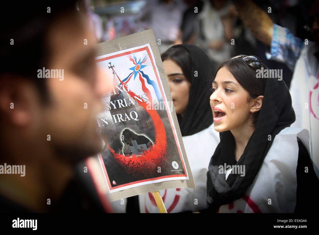 Tehran, Iran. 7th Aug, 2014. An Iranian Assyrian shouts slogans during ...