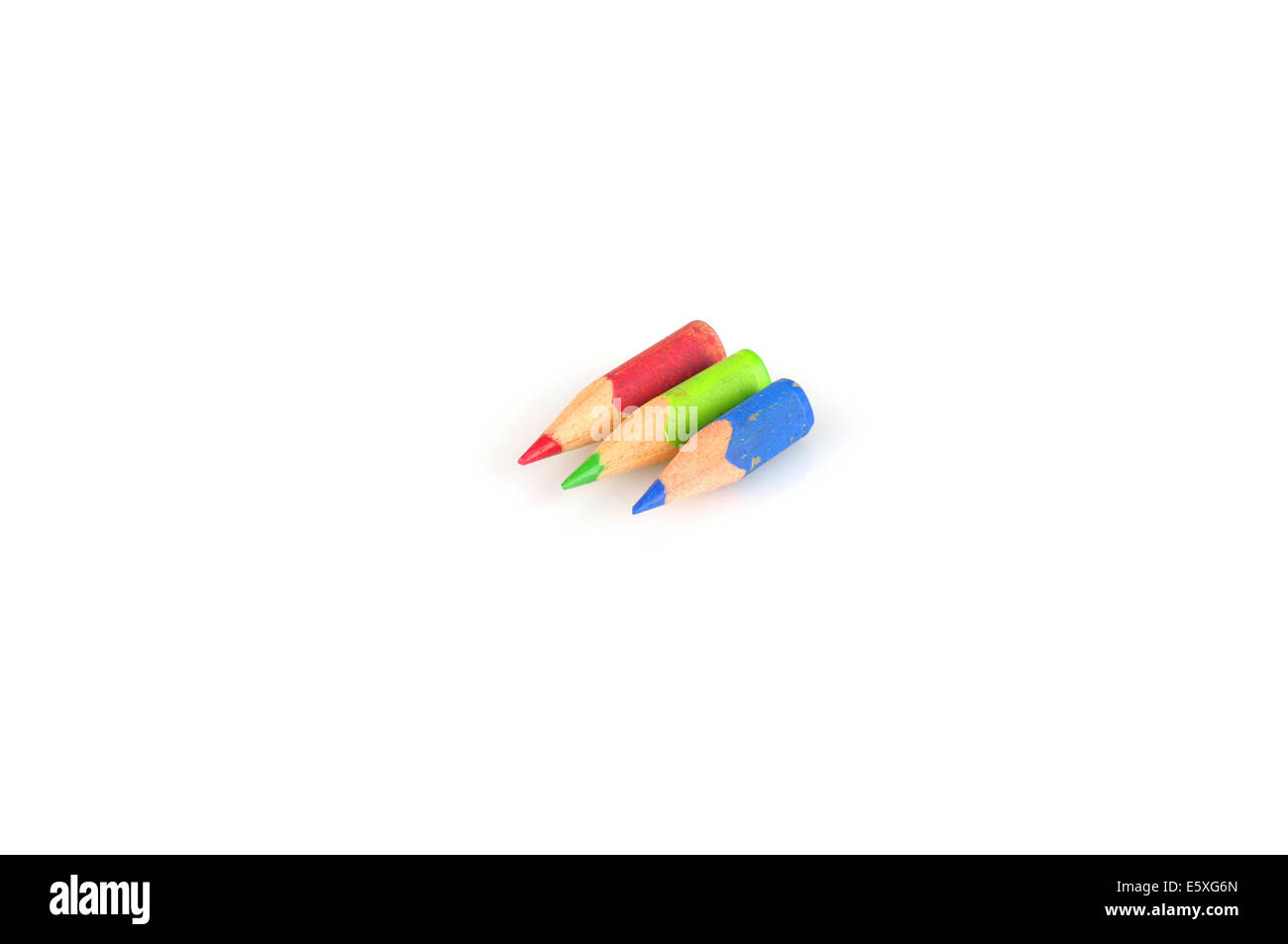 Three small used colored pencils Stock Photo