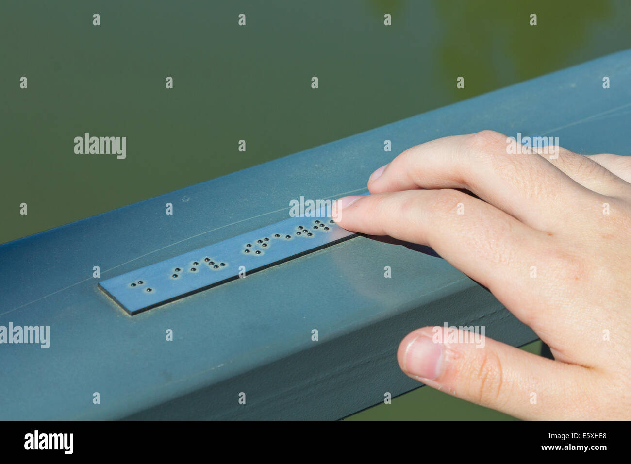 Young hand reading braille writing Stock Photo