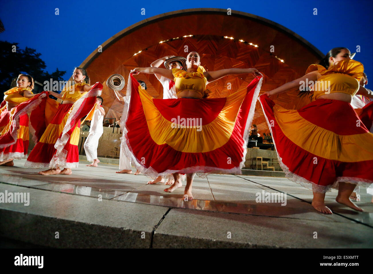 Latin American dancers performing in front of the Hatch Shell on the Esplanade, Boston, Massachusetts, USA Stock Photo