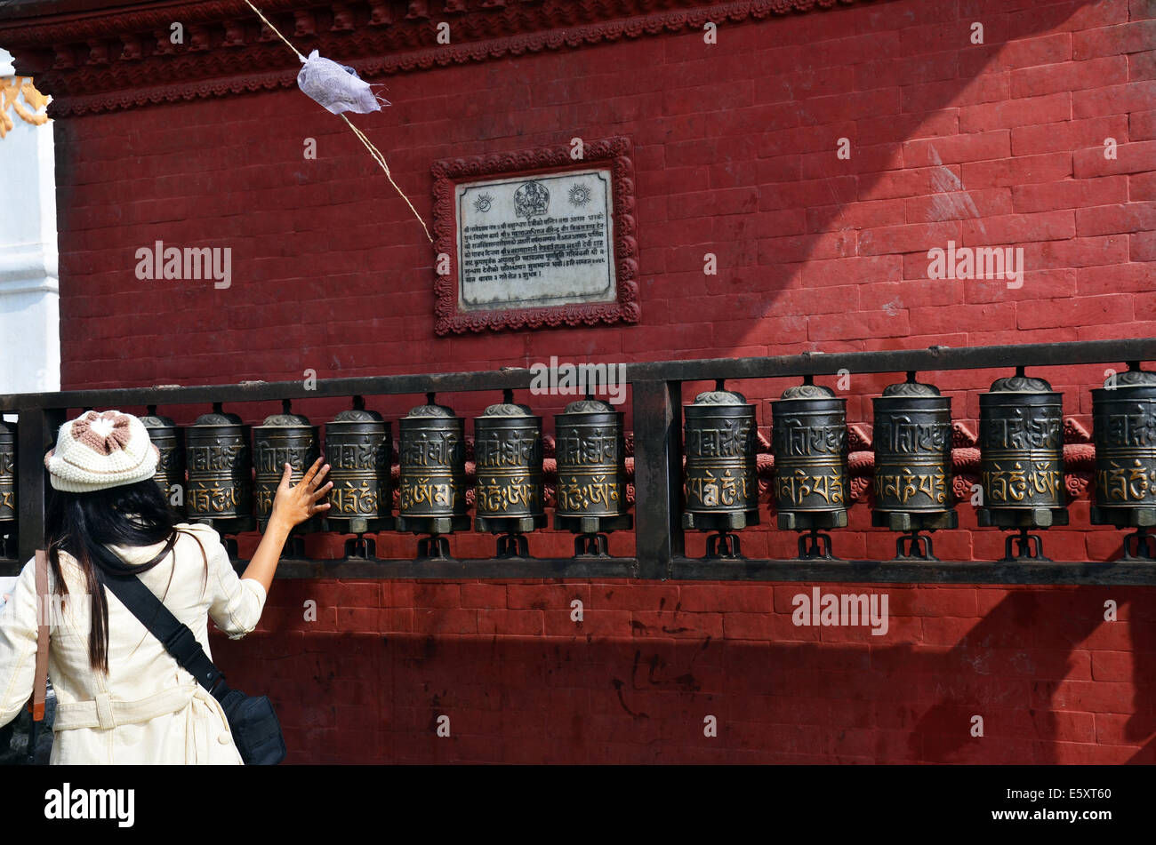 Thai woman spinning prayer wheels in Swayambhunath Temple or Monkey ...