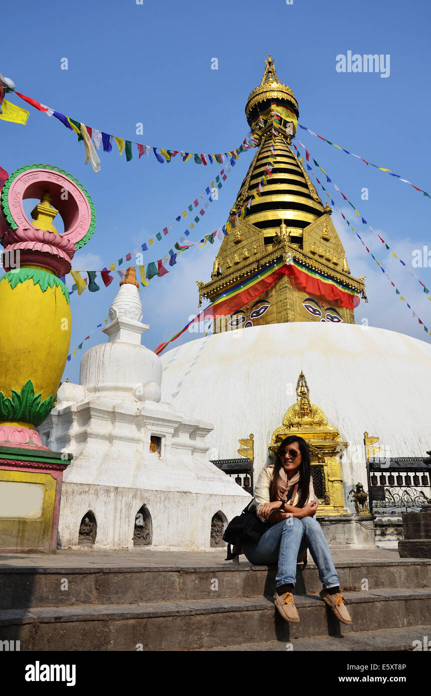 Thai women in Swayambhunath Temple or Monkey Temple with Buddha eyes or ...