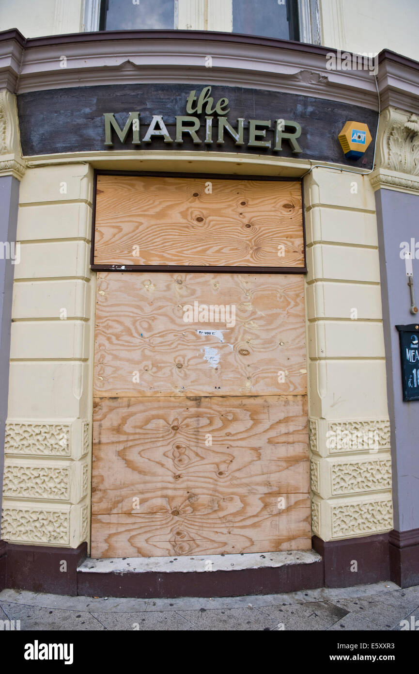 The Mariner boarded up pub on the seafront at Brighton East Sussex England UK Stock Photo