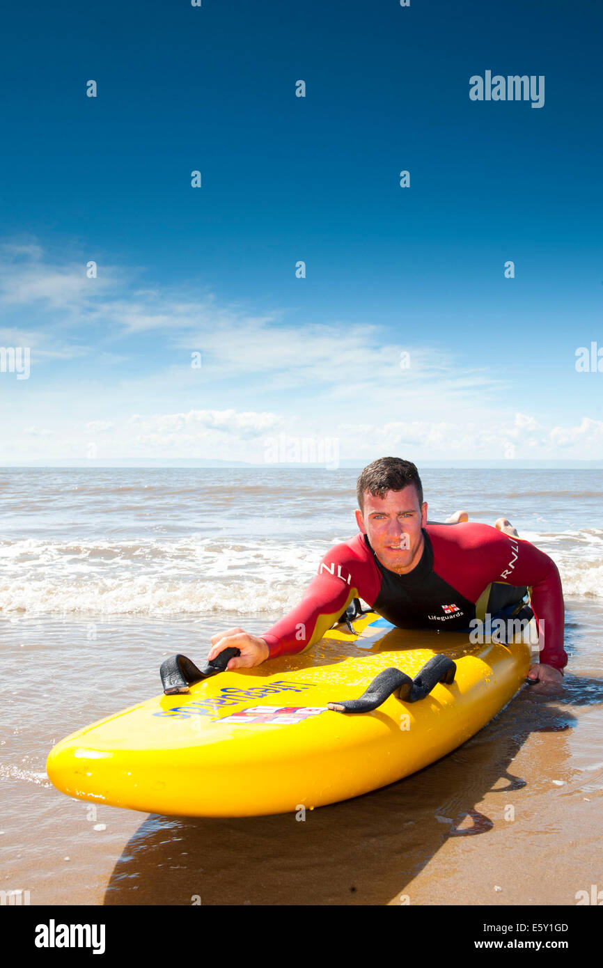 RNLI lifeguards at Whitmore Bay beach in Barry, South Wales. Stock Photo