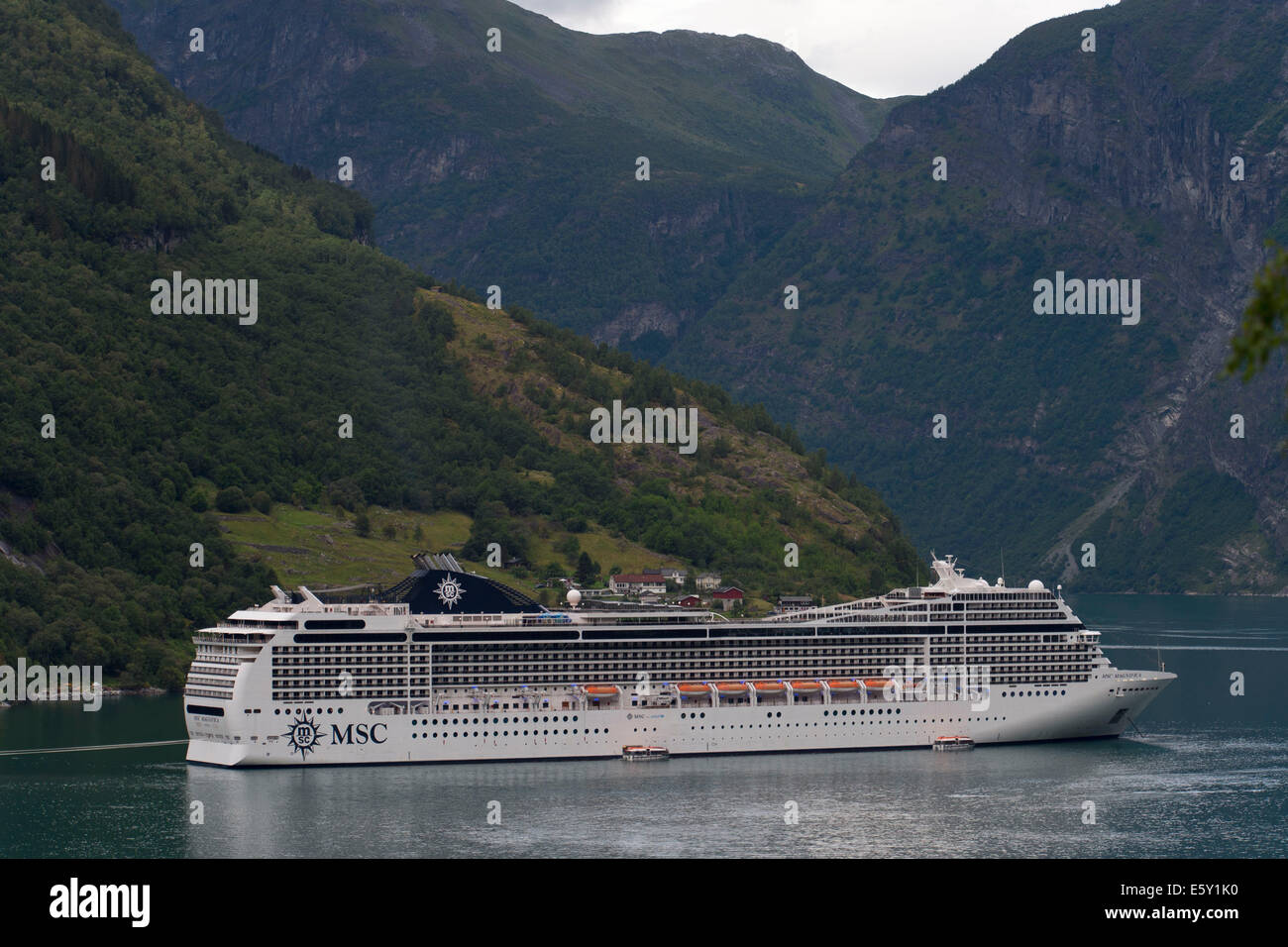 The MSC Magnifica Musica-class cruise ship operated by MSC Cruises at Geiranger in Norway Stock Photo