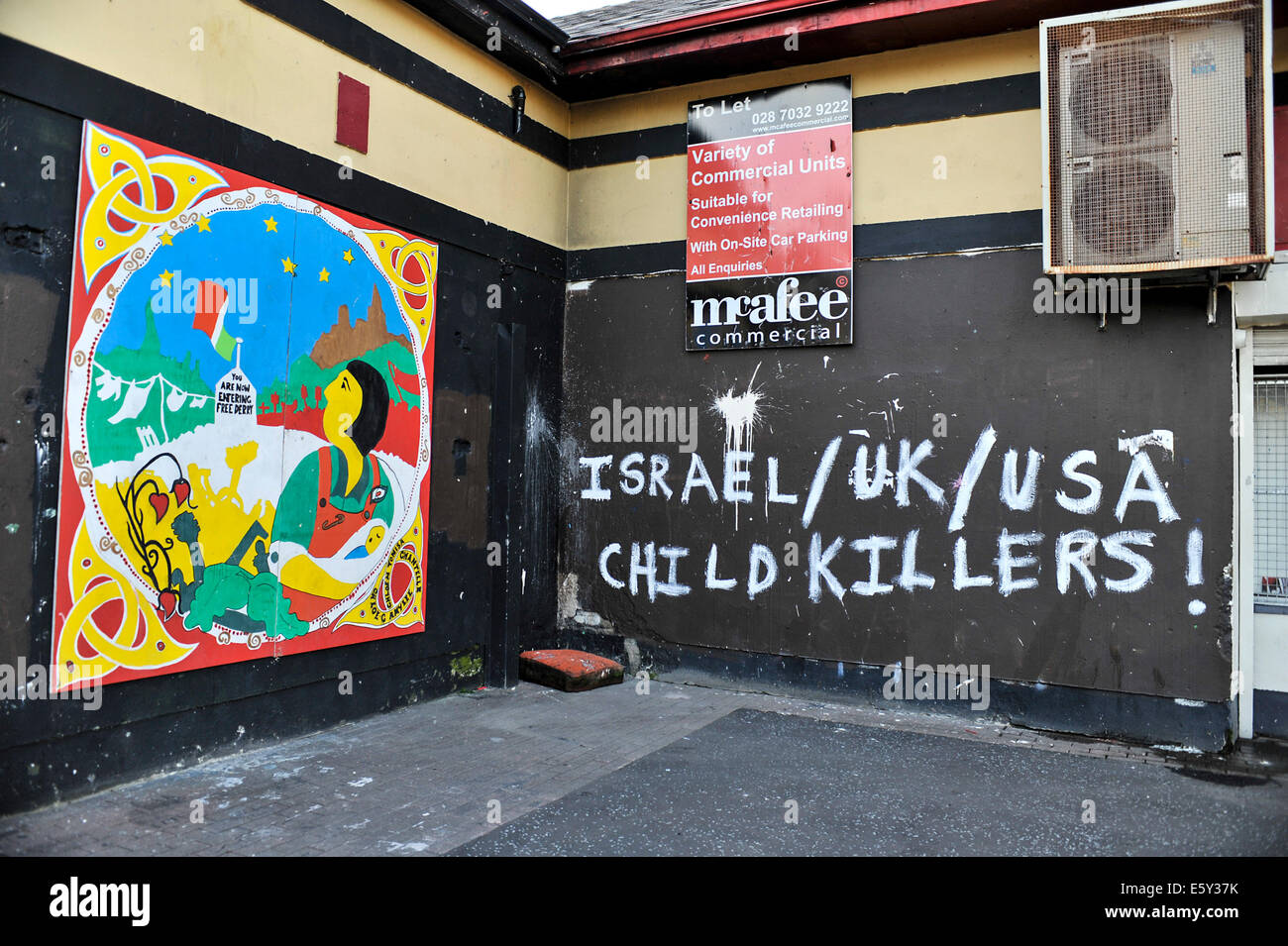 Slogan painted on wall in nationalist Bogside, Derry, Londonderry, reads Israel/UK/ USA child Killers! Stock Photo