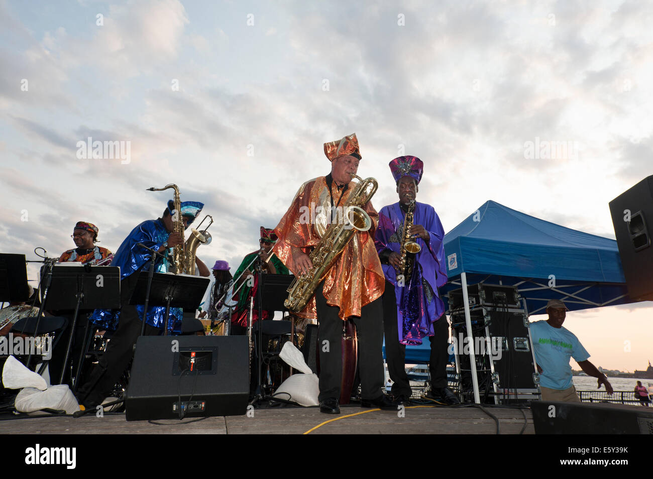 New York, USA. 7th August, 2014.  In a park next to the Hudson River, the Sun Ra Arkestra played a jazz concert in Battery Park City on Aug. 7, 2014. This would have been the 100th birthday of Sun Ra, the Arketra's founder. Credit:  Terese Loeb Kreuzer/Alamy Live News Stock Photo