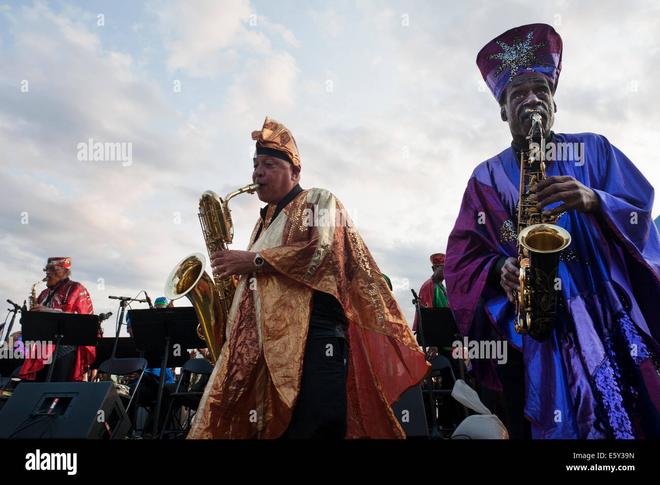 New York, USA. 7th August, 2014.  In a park next to the Hudson River, the Sun Ra Arkestra played a jazz concert in Battery Park City on Aug. 7, 2014. This year marked the 100th birthday of Sun Ra, the Arkestra's founder. Credit:  Terese Loeb Kreuzer/Alamy Live News Stock Photo