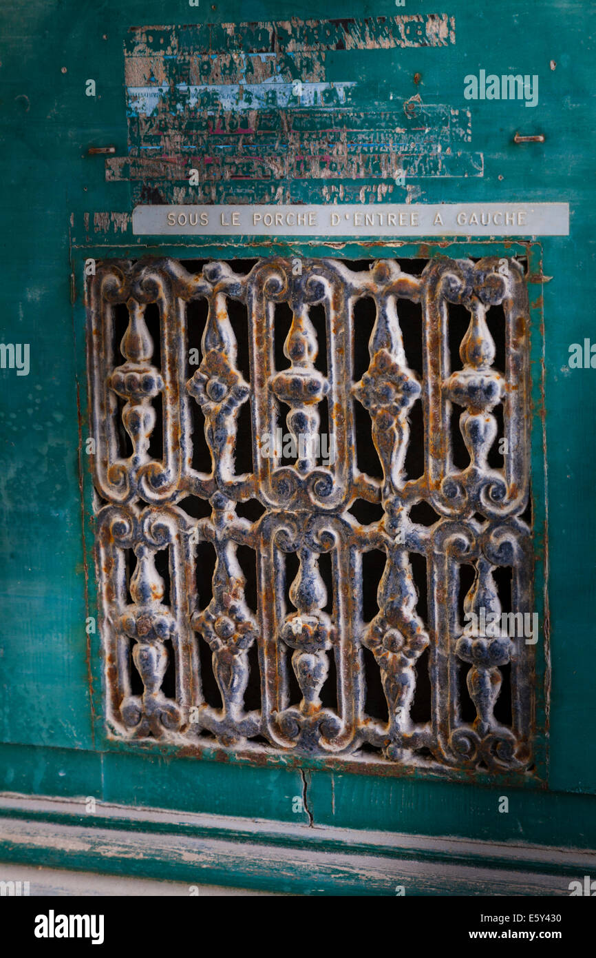 Old grill on an entrance door to the Basilica of Saint Eutropius in Saintes. Stock Photo