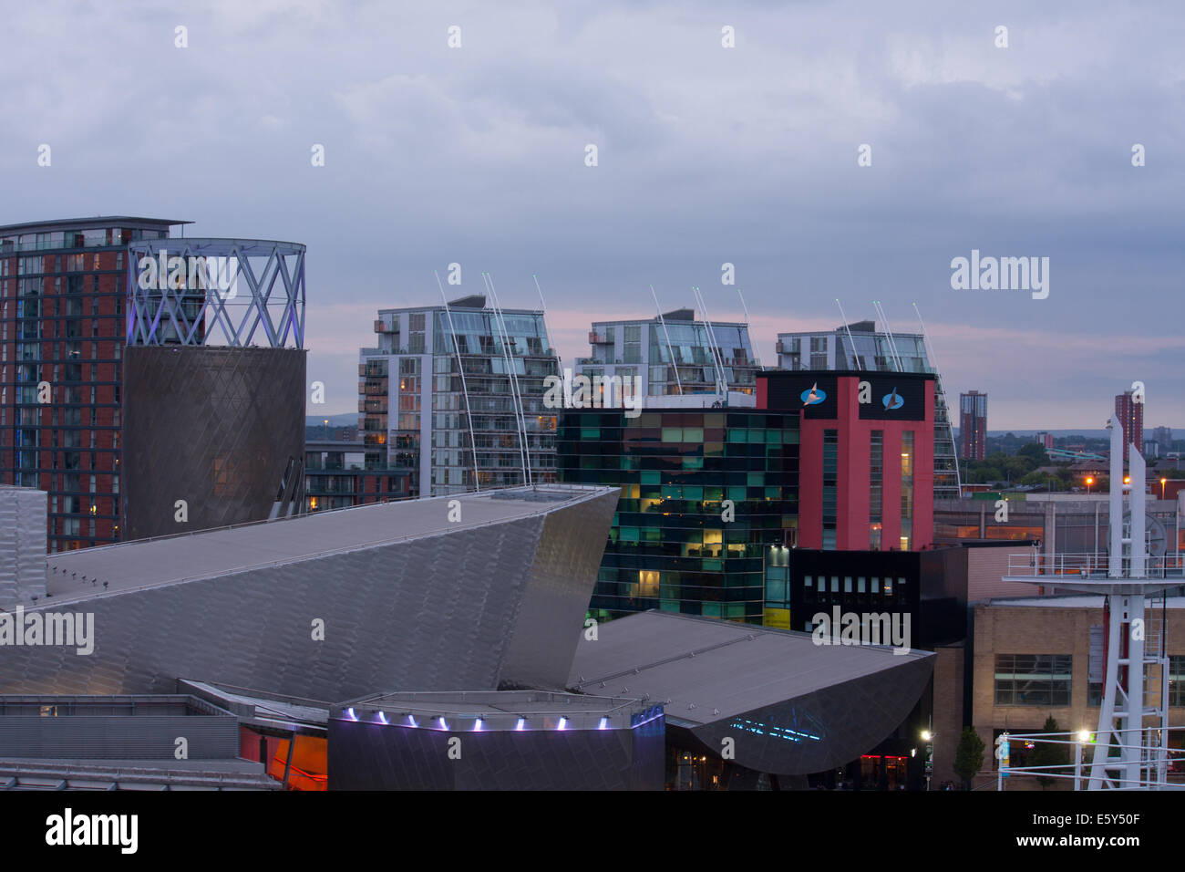 Panorama of Salford Quays and the Lowry Theatre in Manchester, UK at dusk, shot from the top of Quay West. Stock Photo