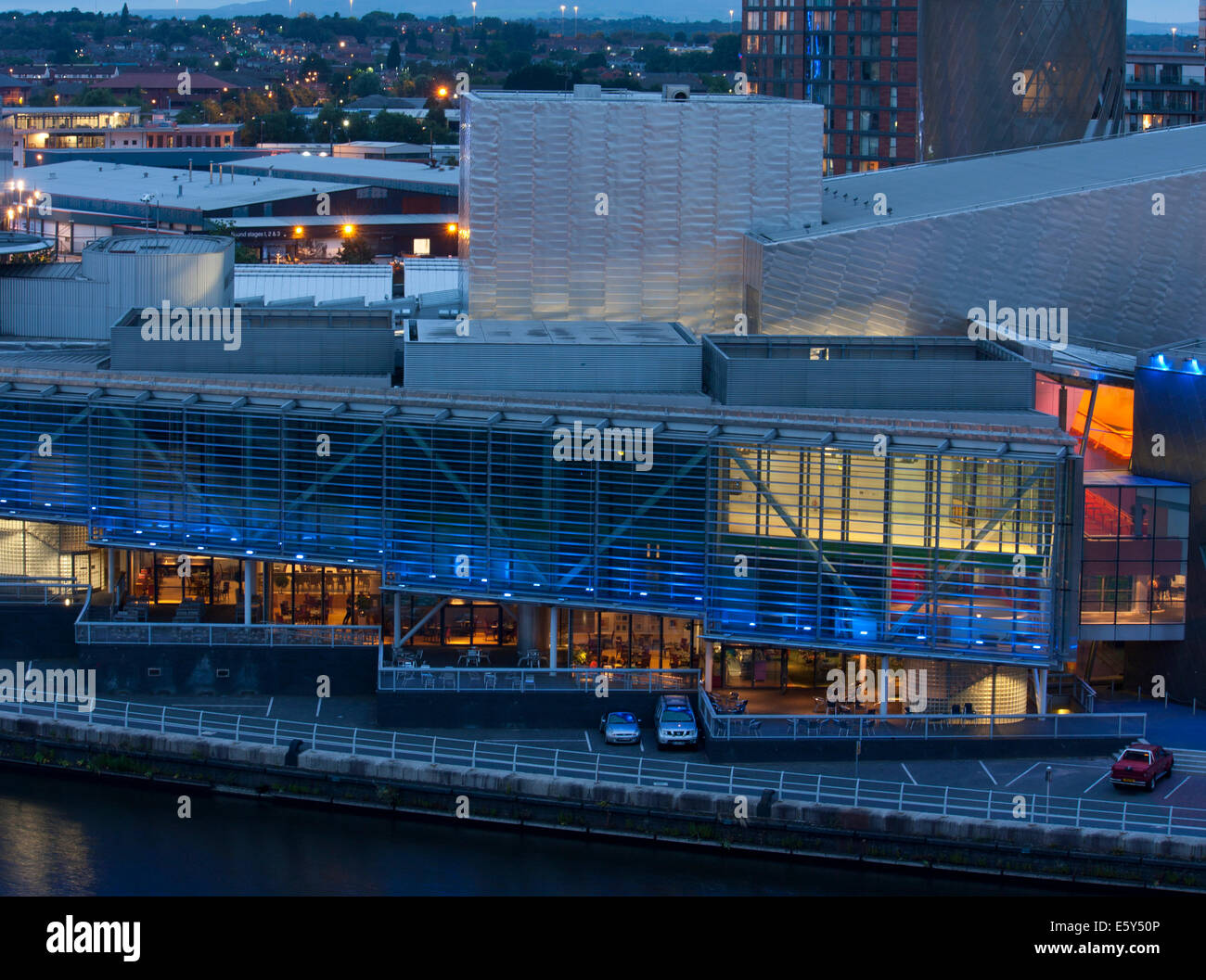 Panorama of Salford Quays and the Lowry Theatre in Manchester, UK at dusk, shot from the top of Quay West. Stock Photo
