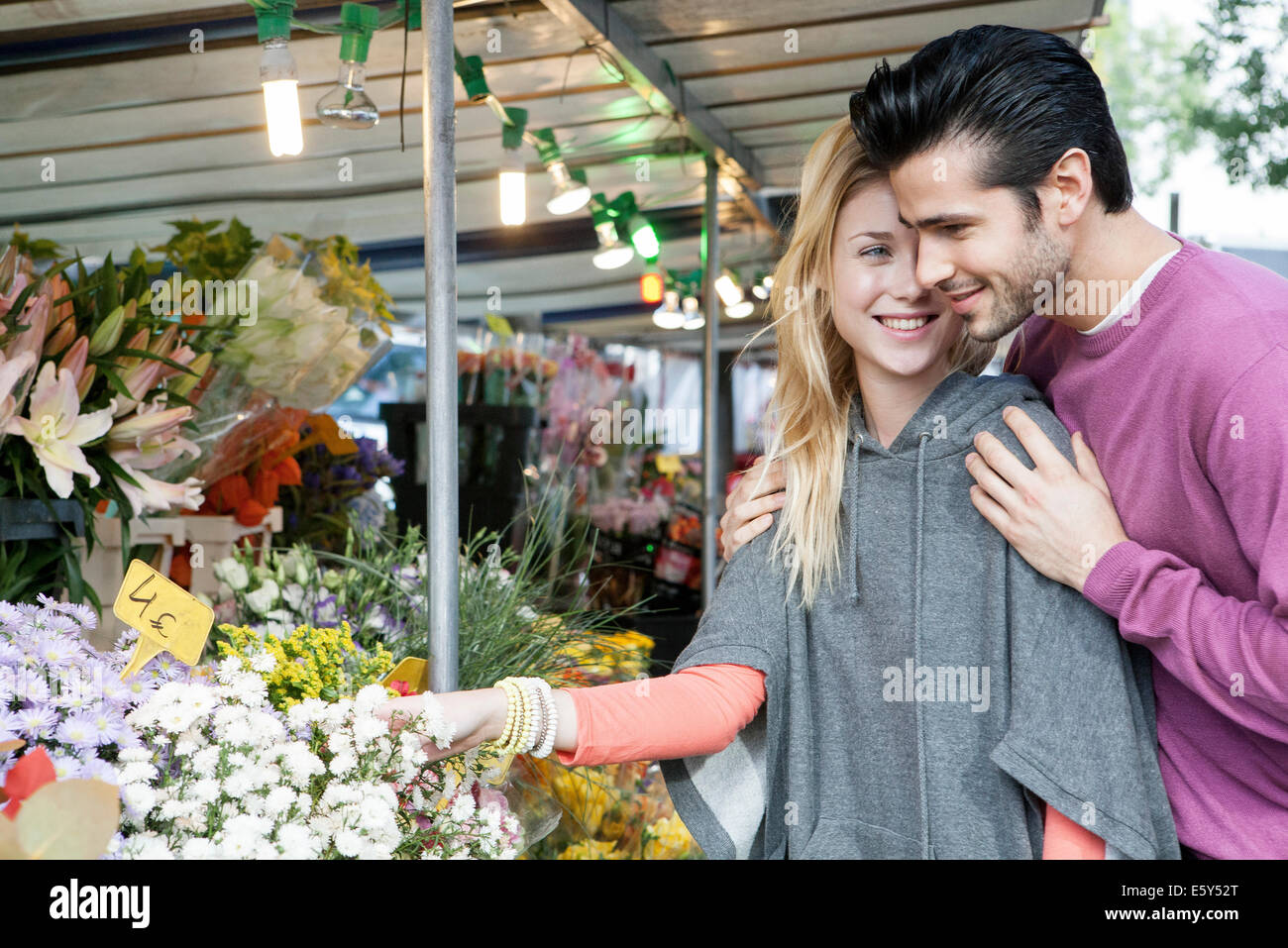 Young couple at flower market Stock Photo