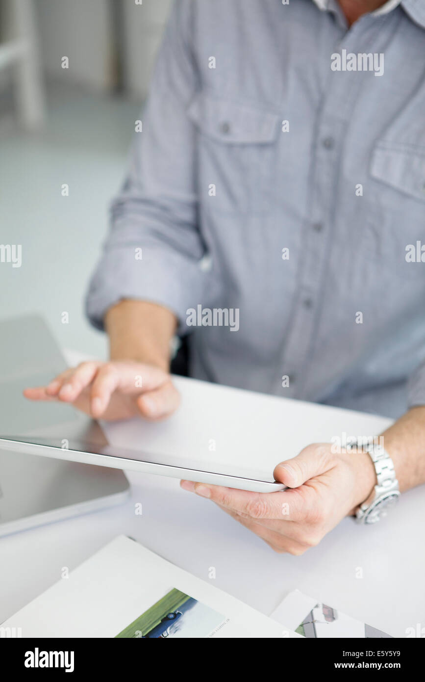 Businessman hands touching tablet screen hi-res stock photography and ...