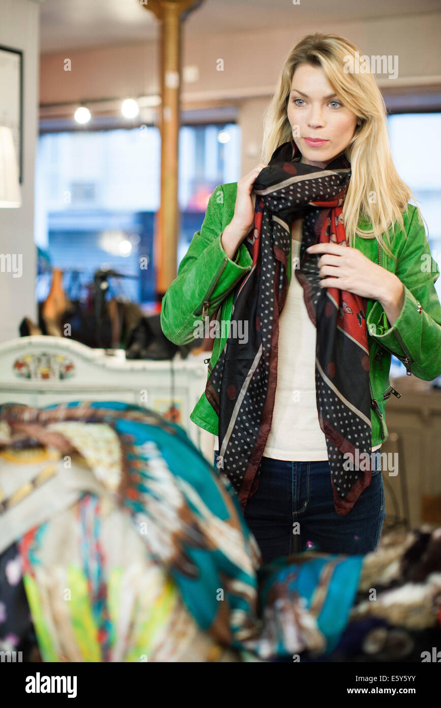 Woman shopping for new scarf Stock Photo