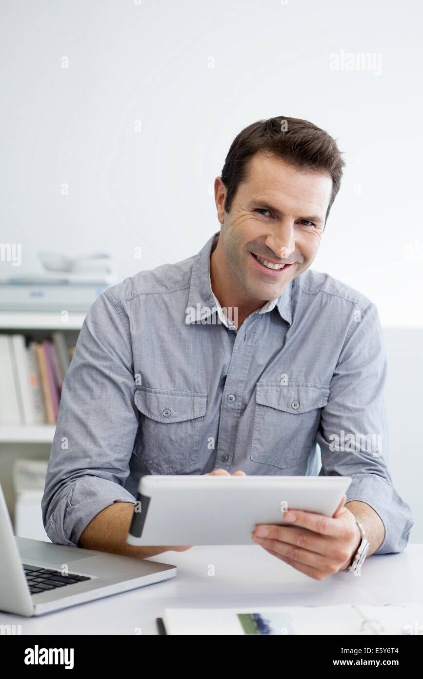 Office worker using digital tablet Stock Photo Alamy