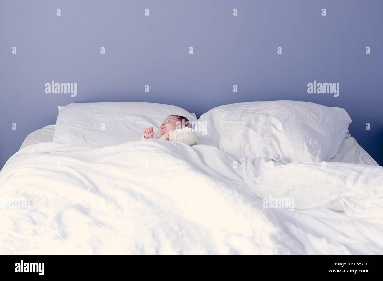 New born baby sleeping in bed Stock Photo Alamy