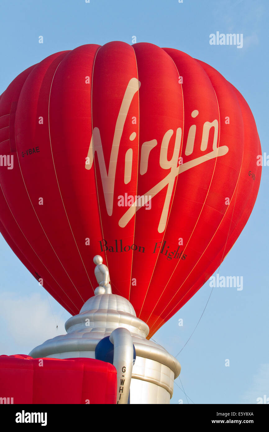 Bristol, UK. 8th August, 2014. Virgin Balloon lifts off during the Bristol International Balloon Fiesta Credit: Keith Larby/Alamy Live News Stock Photo