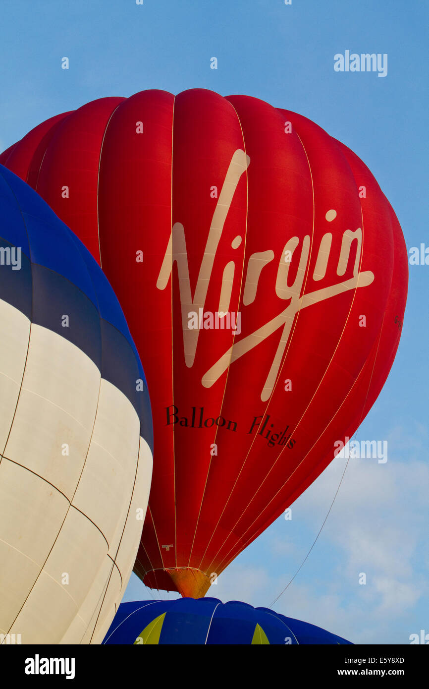 Bristol, UK. 8th August, 2014. Virgin Balloon lifts off during the Bristol International Balloon Fiesta Credit: Keith Larby/Alamy Live News Stock Photo