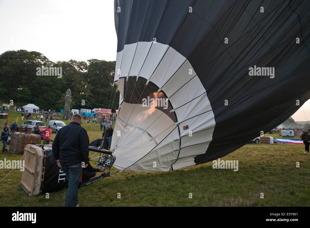 Bristol, UK. 8th August, 2014. Balloon inflation before lift off at the Bristol International Balloon Fiesta Credit: Keith Larby/Alamy Live News Stock Photo