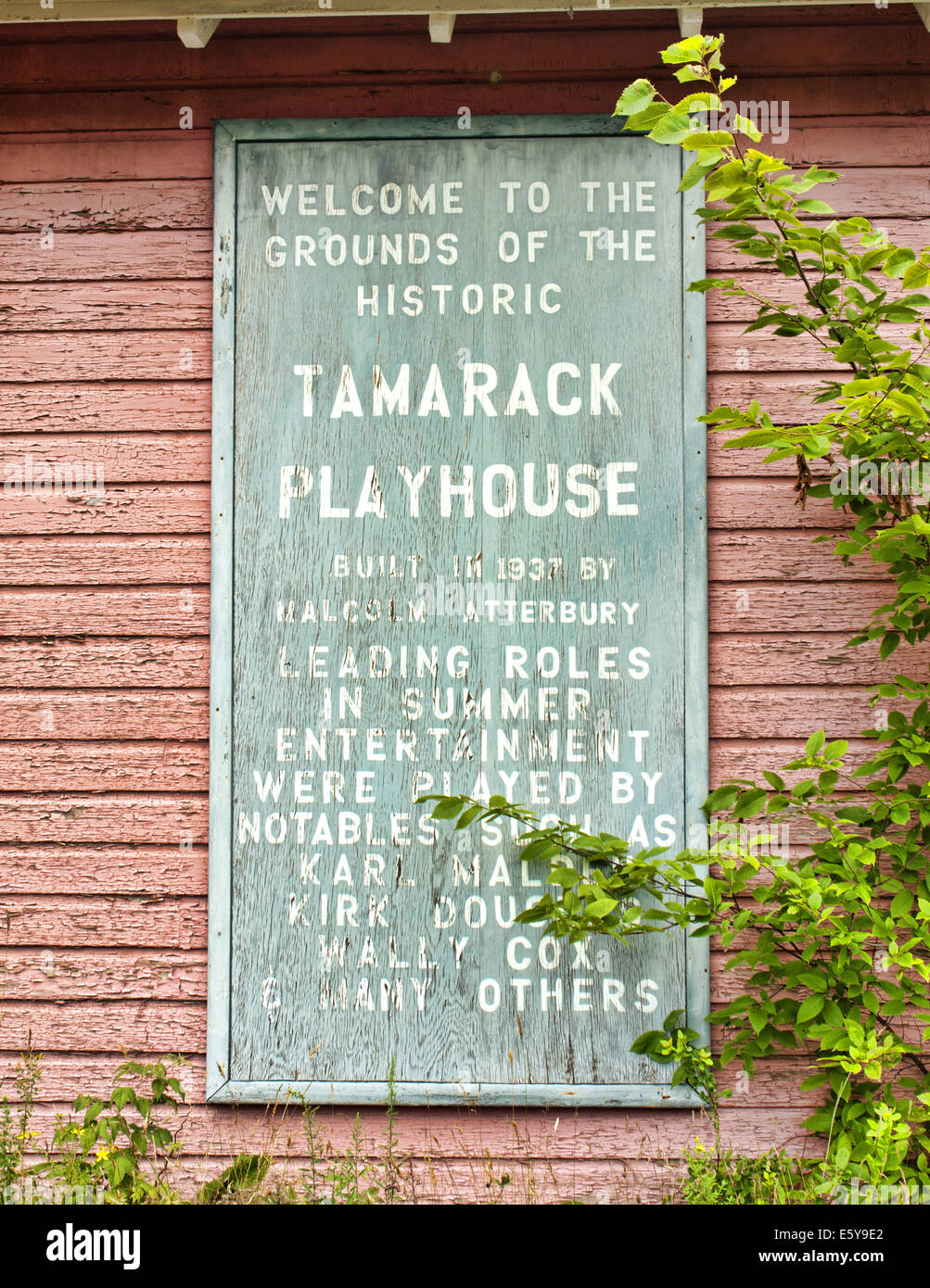 old weathered sign on the exterior of the historic Tamarack Playhouse in Lake Pleasant, New York Stock Photo