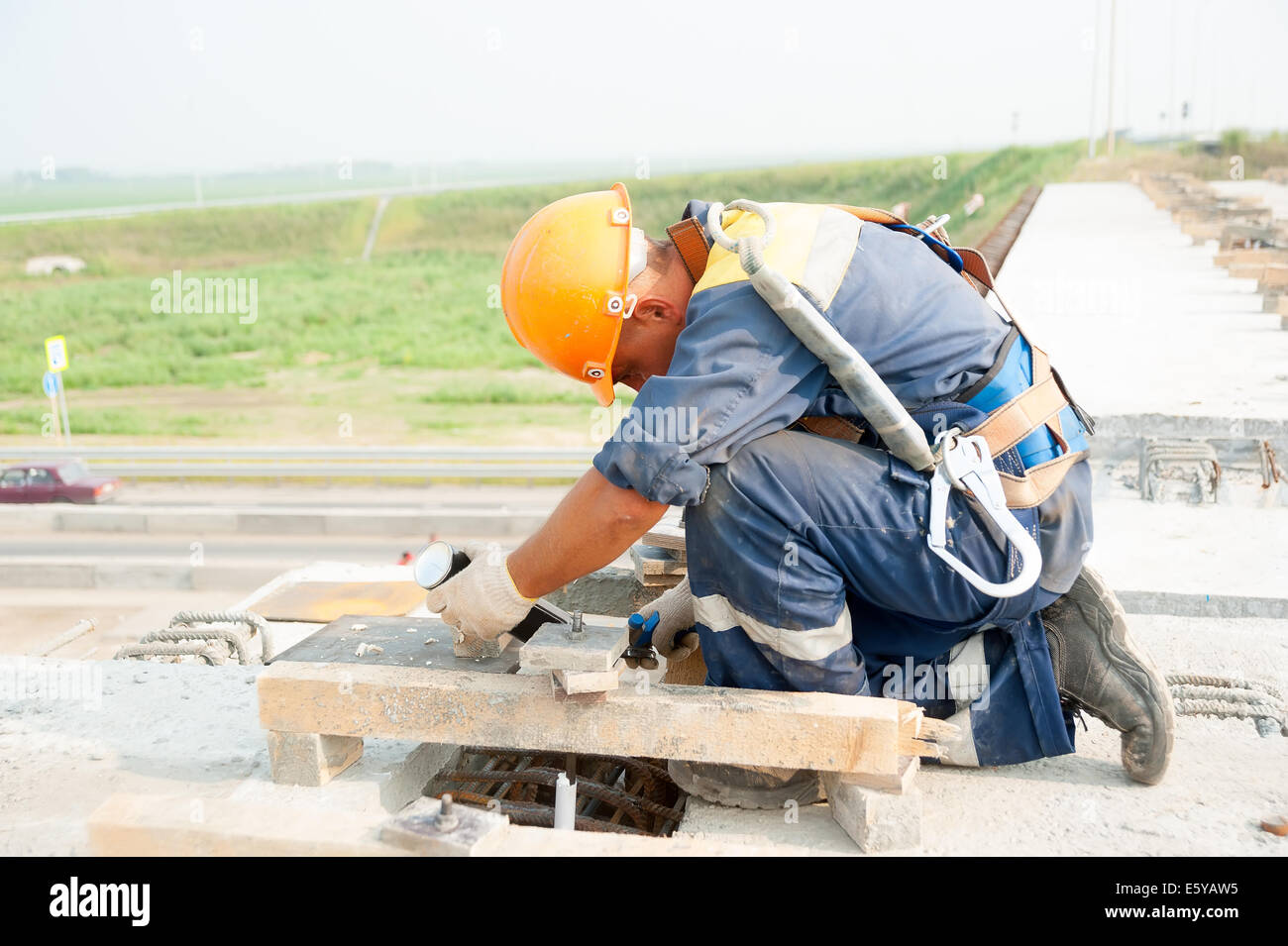 Worker on bridge construction Stock Photo Alamy