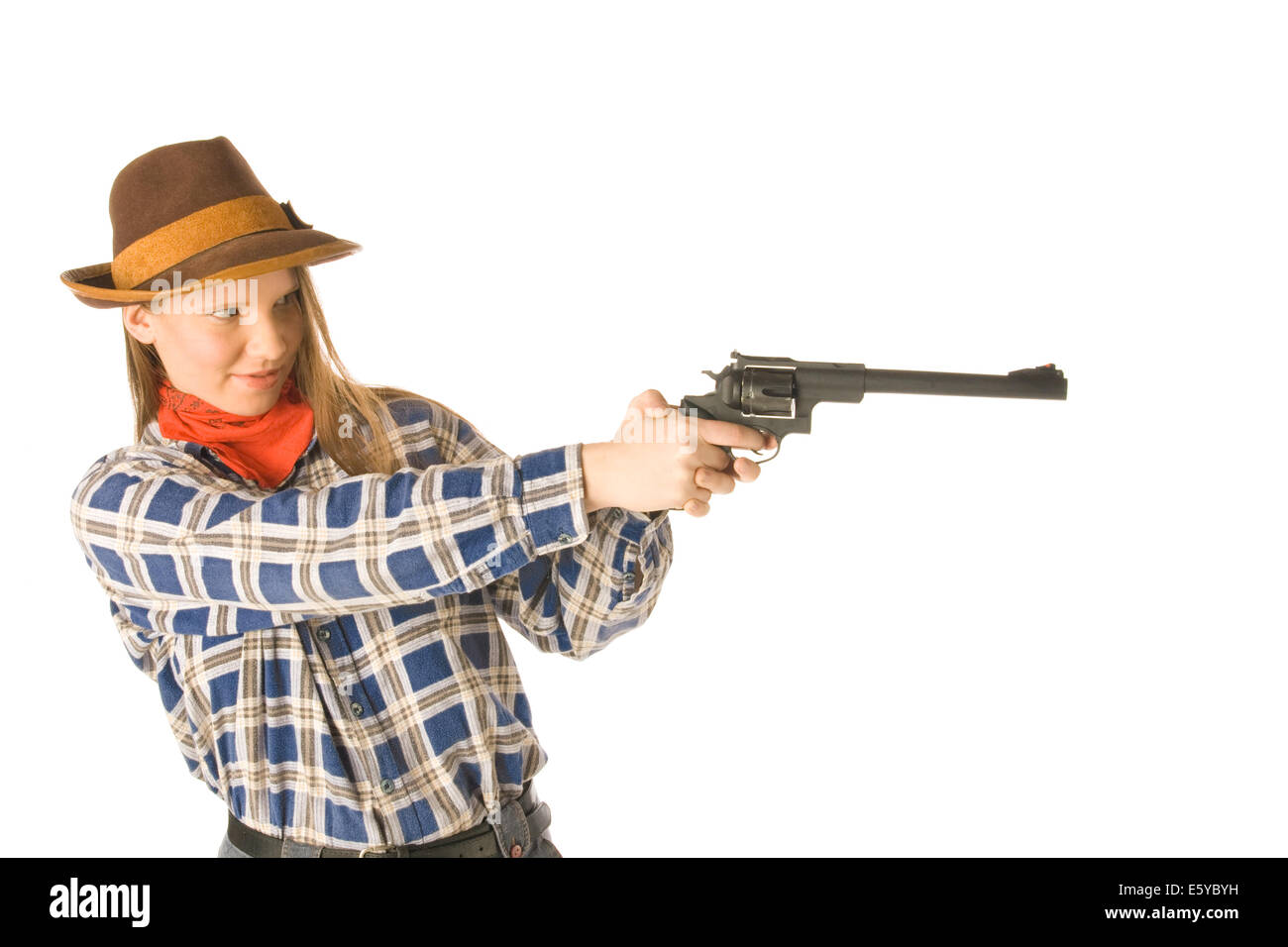 An isolated photo of a cowgirl with a gun Stock Photo