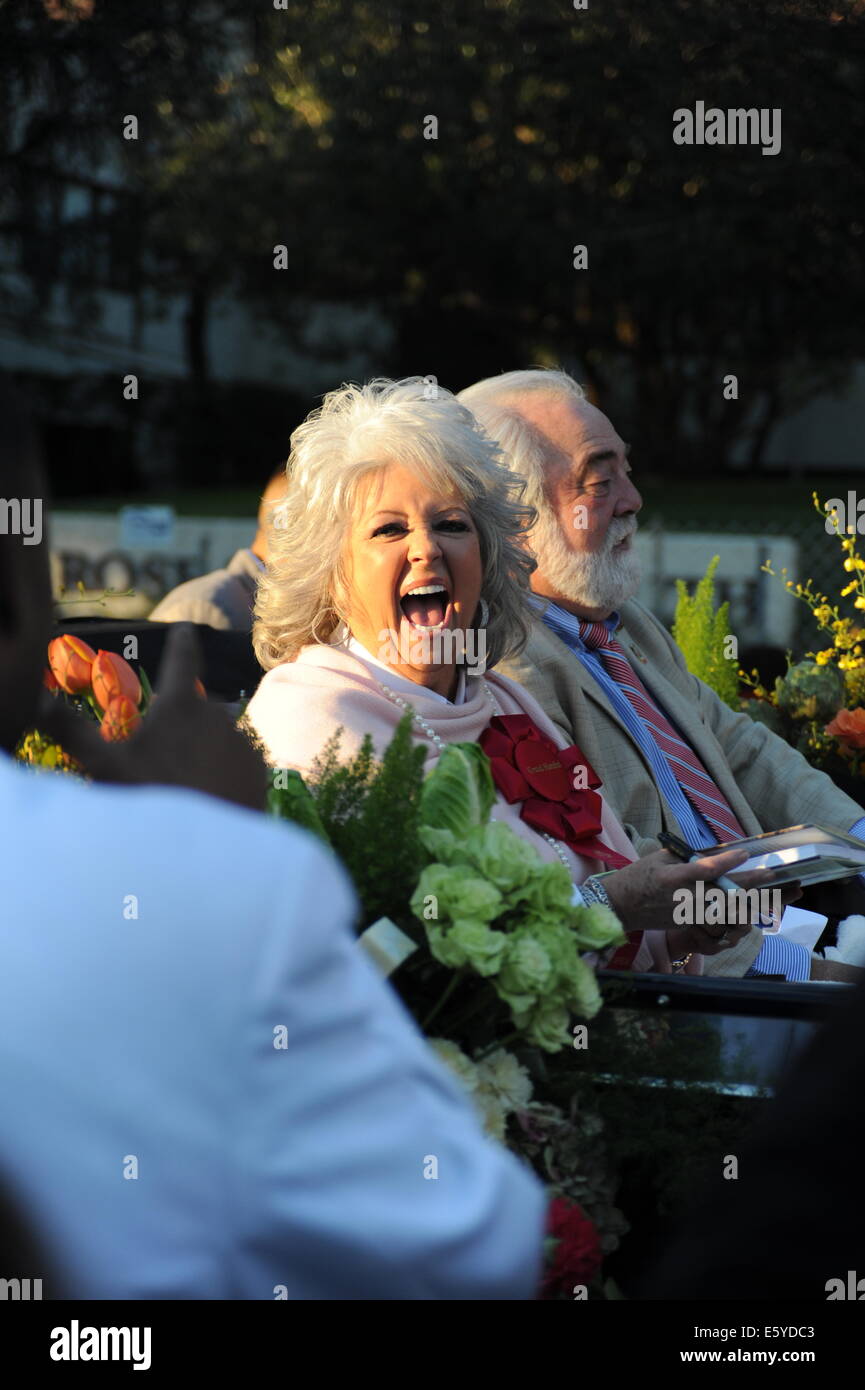 Tournament of Roses Grand Marshal Paula Deen (L) and her husband Michael Groover ride down Colorado Boulevard during the 122nd Rose Parade in Pasadena Stock Photo