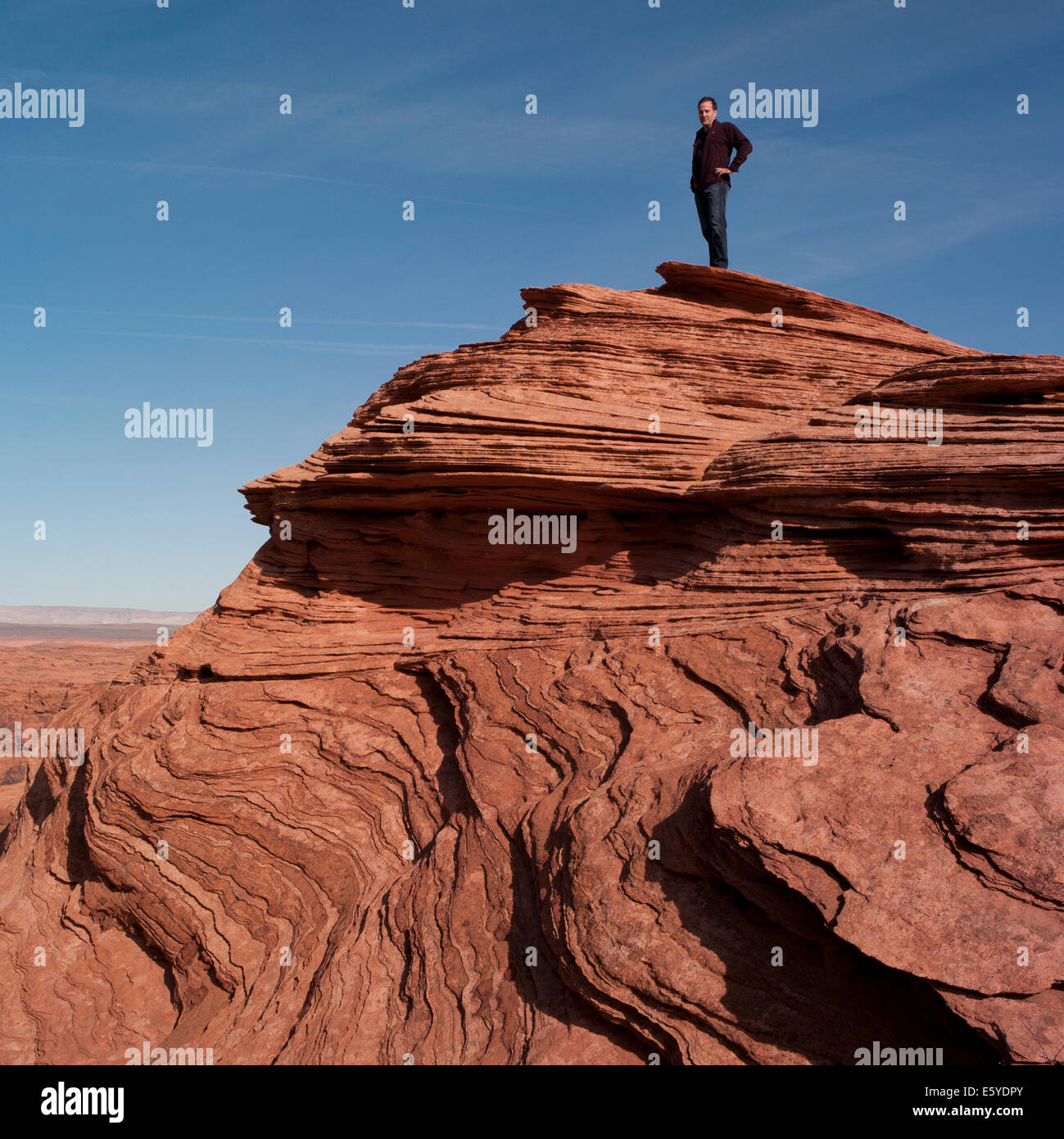 Man standing on a rock hi-res stock photography and images - Alamy
