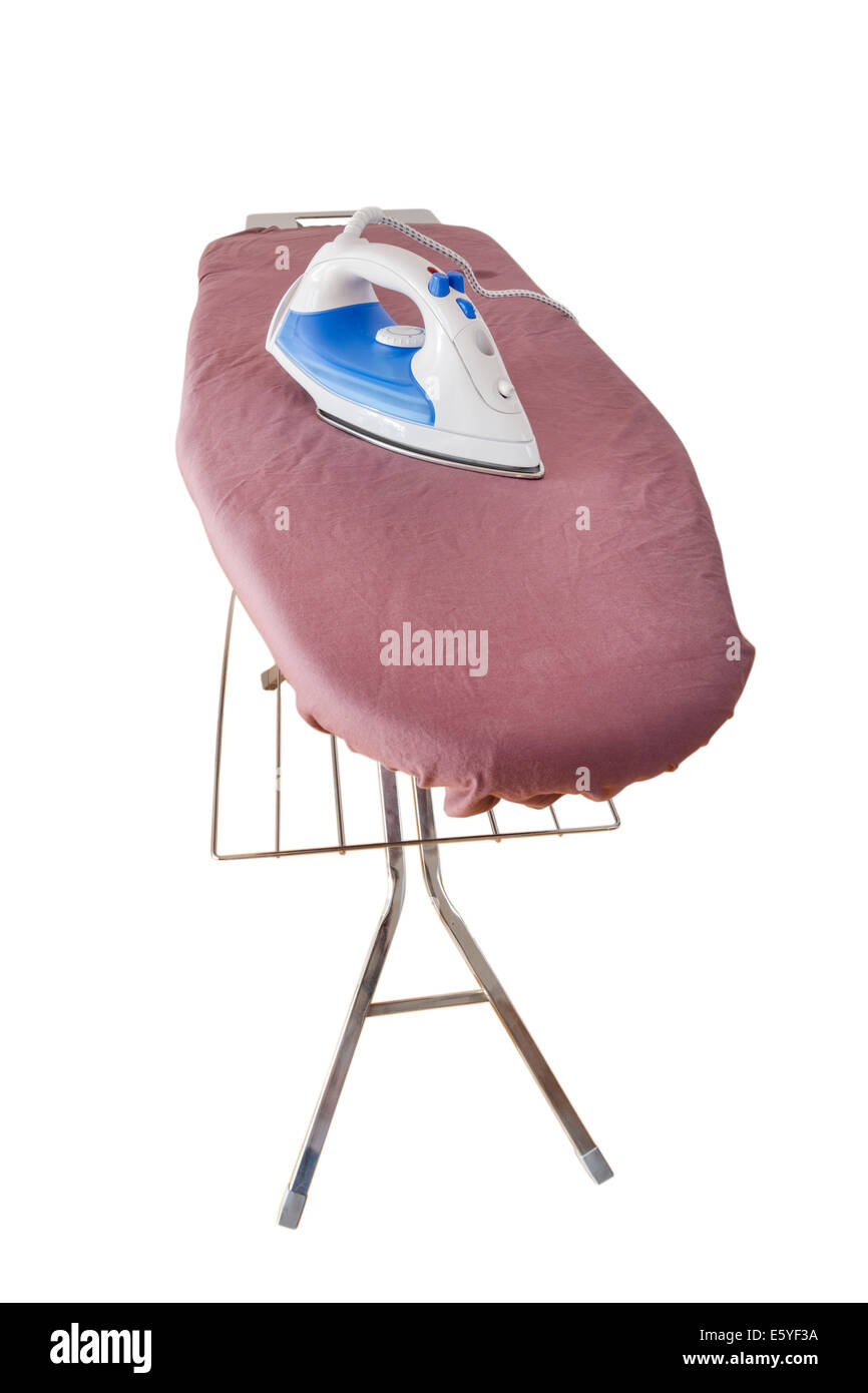 A steam iron on an ironing board isolated on white background Stock