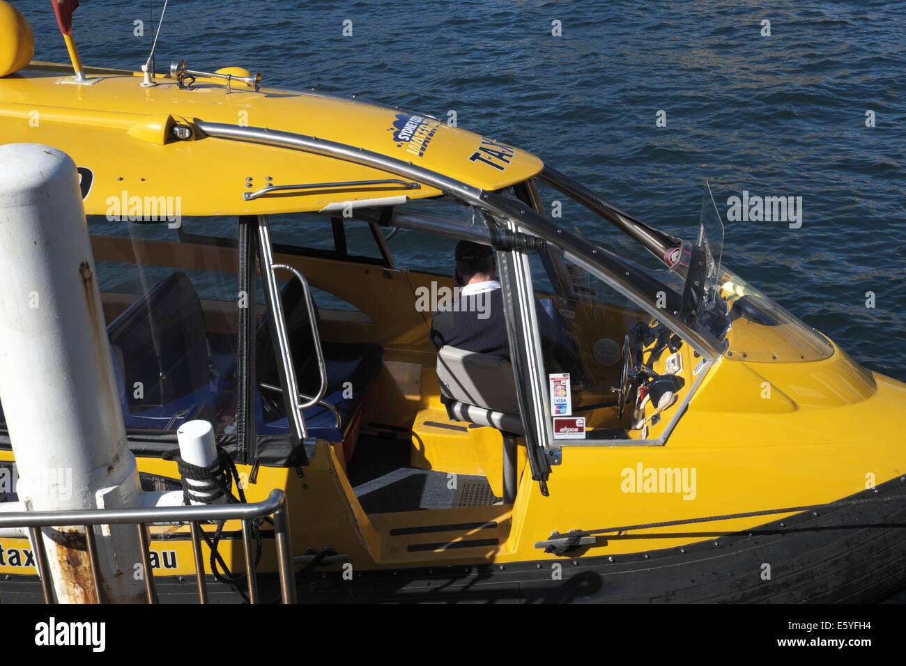 yellow sydney water taxi and pilot in circular quay,sydney Stock Photo