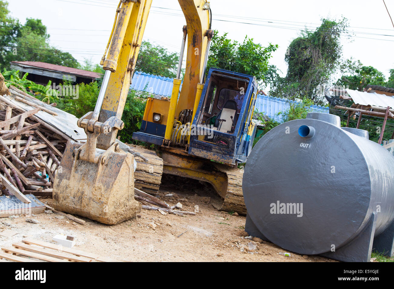 Medium sized Excavator at building area Stock Photo