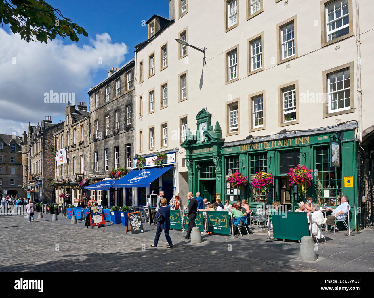 Grassmarket in the old town of Edinburgh on a sunny day with visitors