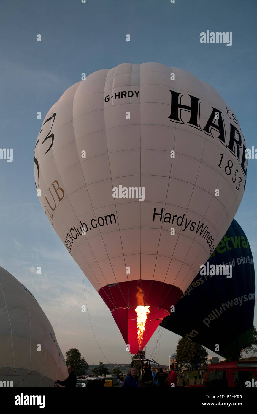 Bristol, UK. 8th August, 2014. Hardy's Balloon inflating at the Bristol International Balloon Fiesta Credit: Keith Larby/Alamy Live News Stock Photo